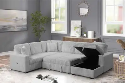 This is a stylish corduroy sectional sofa, perfect for adding a touch of modern comfort to your livi...