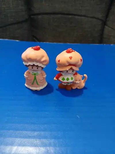 strawberry shortcake miniature figures like new $15 for both , View more
