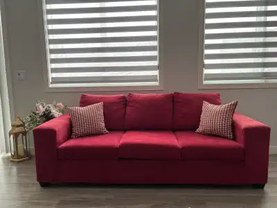 Leon’s couch set with a rug, View more