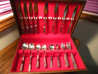 New 42 piece Stainless Steel Flatware and Case For Sale