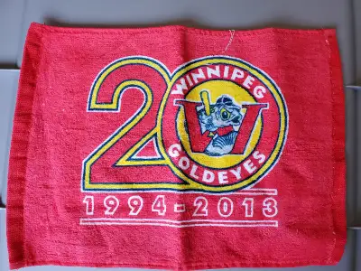 23 06 17 SgeT Winnipeg GOLDEYES 1994-2013 Selling 12” x 9” towel commemorating the Goldeyes 20th sea...