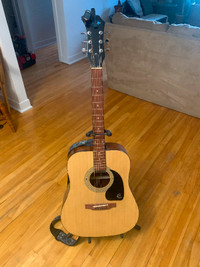 Acoustic Guitar with accessories $200