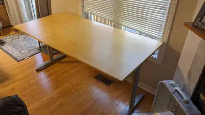 Ikea height-adjustable desk, View more