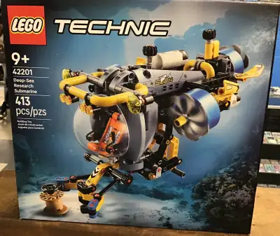 Explore the depths with this Lego Technic 42201 Deep-Sea Research Submarine, a 413-piece set designe...