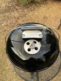 Weber 18 inch charcoal grill used in good condition .