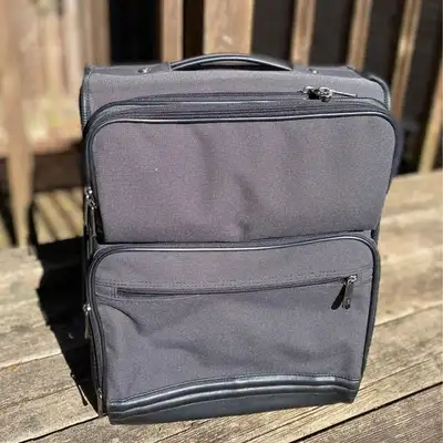 Like New Carry on suitcase, View more