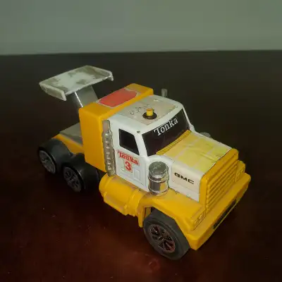 For Sale! Used vintage Tonka GMC truck toy. Pretty beat up. Stickers are sun bleached. Chrome on the...