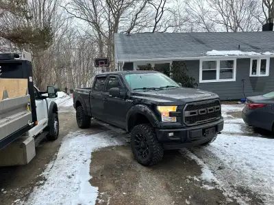 Lifted f150 sport 5.0 with duel exhaust.