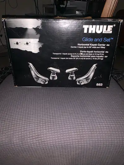 Transport your kayaks with ease using this Thule Glide and Set 883 horizontal kayak carrier, designe...