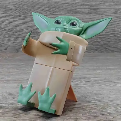 ***NOTE BEFORE MESSAGING: If the ad is up, yes it is available.*** 1 Baby Yoda flexible phone holder...