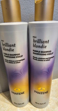 2 bouteilles shampoing violet