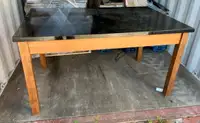 Vintage Wood table from the 1950's.with a black top