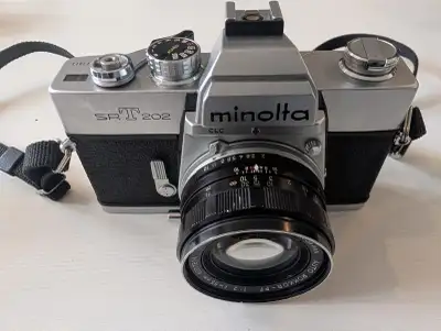 Vintage SRT 202 camera with lenses, View more