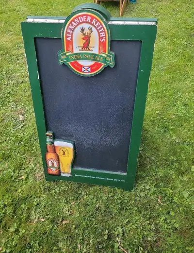 Vintage Alexander Keith's double sided sidewalk chalkboard sign.