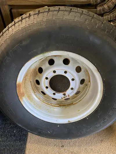 RV tire, rim and new cover for sale. Tire has never been used. Size in the picture. Also comes with...
