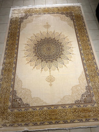 White and gold persian rug