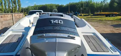 18 ft ski boat open bow, does have a small leak at back by motor mount