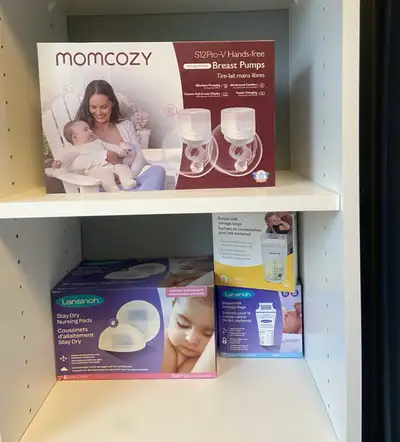 Momcozy Brest pump and pads and milk bags , View more