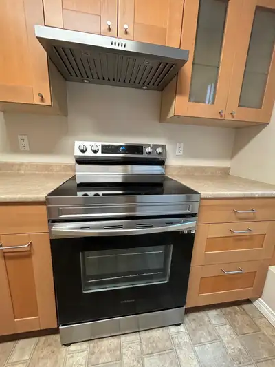 This ground level unit in Surrey features three bedrooms and one bathroom. It has a spacious layout...
