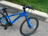 Bike for child. Like new. Blue and black.