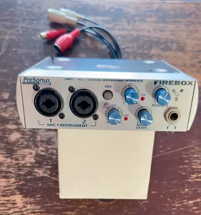 Older PreSonus firebox with extra breakout cables and connecter to Apple computer FireWire. (Still w...