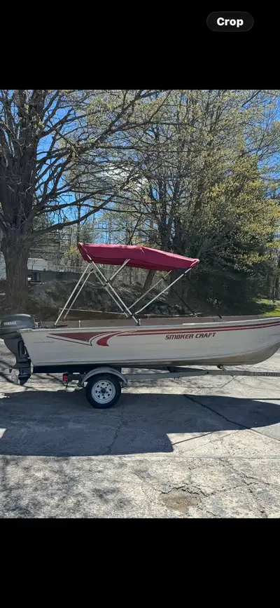2006 Deep hull 14’ Smokercraft with a 4 stroke Yamaha 15 hp with Electric start . Comes with Galvani...