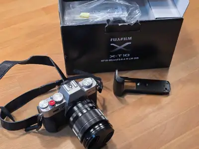 Fujifilm XT10 with 18-55 f2.8-4 kit lens, View more
