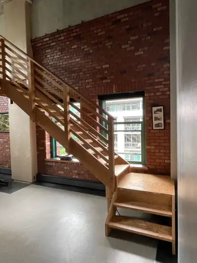 Temporary stairs built and installed while spiral staircase was fabricated. These stairs are complet...