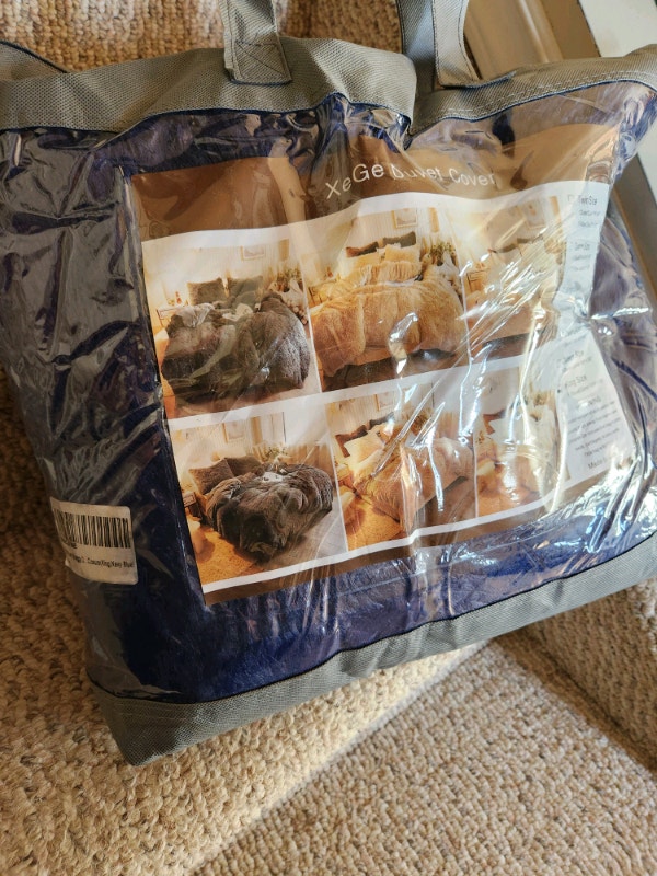 New in packaging very soft king blanket or used as duvet cover