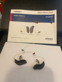 Oticon hearing aid left and right and streamer 