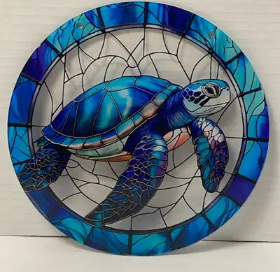 Pick up in Noelville. Delivery/Shipping also available. New, unused blue sea turtle acrylic suncatch...