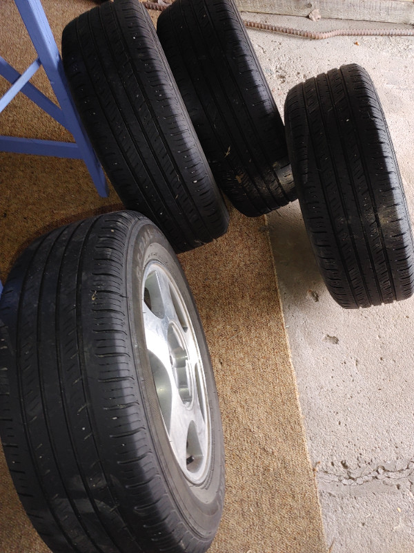 ALL SEASON TIRES 4 On RIMS 215/60/15 HONDA Toyota ni in Tires & Rims in Saskatoon