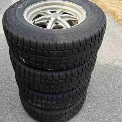 Snow tires and lugs off 2017 Silverado. Used for 4 seasons. Lots of tread.
