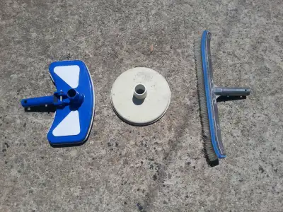 I filled in my pool so I won't be needing these. They're fairly new. Brush, vacuum head, and a Skim...