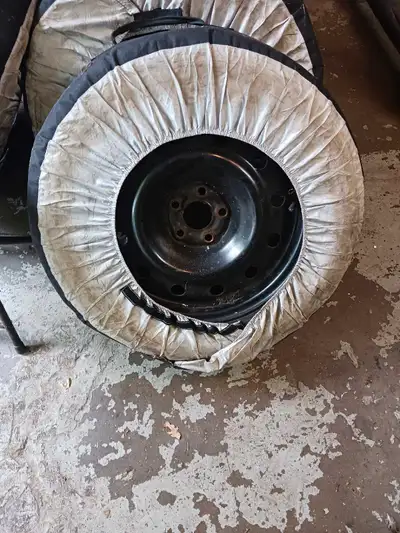 I am selling a set of205/60r16 snow tires on steel rims and 4 storage covers