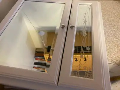 Interior 3 1/2” deep Mirrored doors Box exterior is 22 3/4” wide 23 3/4” high Front trim is 2” large...