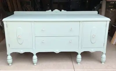 LARGE SIDEBOARD 2 CUPBOARDS 2 DRAWERS PAINTED IN A PASTEL GREEN FINISHED WITH GLASS KNOBS CUPBOARD L...