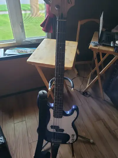 Fender squier p-bass. Comes with amp and soft case also a stand. Pickup near stone rd mall