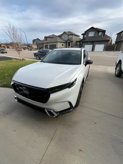 2023 Honda CR-V Sport Touring Hybrid – Low KM, Fully Loaded, Warranty Included! Looking for a fuel-e...