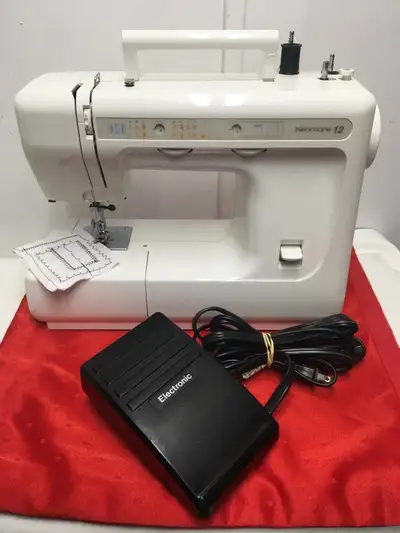KENMORE 12 portable sewing machine , View more