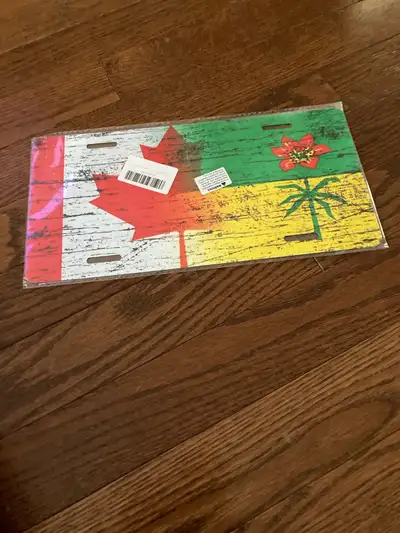 Add some flair to your ride with this Canada meets Jamaica novelty license plate! This new license p...