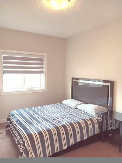 Looking for a female tenant. 1 Furnished room for rent in a new 3 bedroom house. New neighborhood, c...