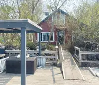 Delta Beach lake front cottage for sale on Lake Manitoba