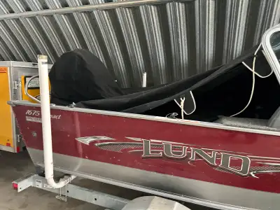 This boat has been stored inside every single hour it was not on the water. 1675 Impact Lund with a...