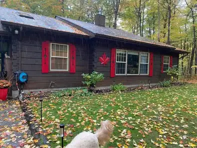 Welcome to this beautifully maintained ranch-style Confederation log bungalow, ideally situated in t...