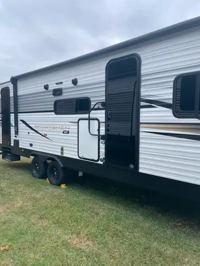 2024 Sportsmen SE 261 BHKSE, a versatile travel trailer perfect for family adventures. This unit has...