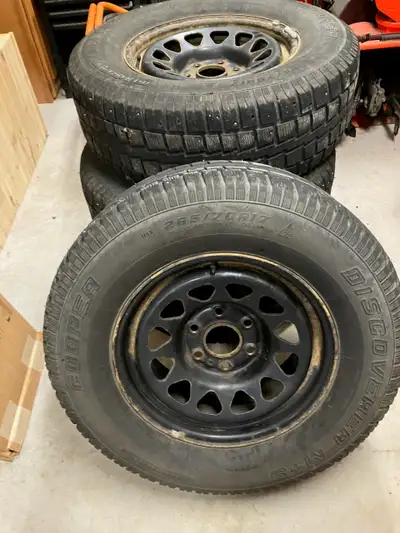 Four Cooper Discoverer M+S 17 inch Studded Tires. Mounted on 6-hole rims. 265/70R $300.00 Call or te...