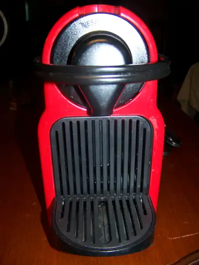 Nespresso Inissia Espresso Machine in Gloss Black or Apple Red., View more