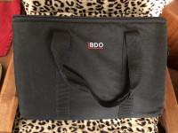 Large padded black tote bag with laptop storage