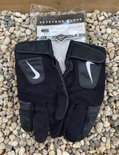 Available if posted. Nike leather black with white baseball / softball gloves. Adult size medium. Ge...